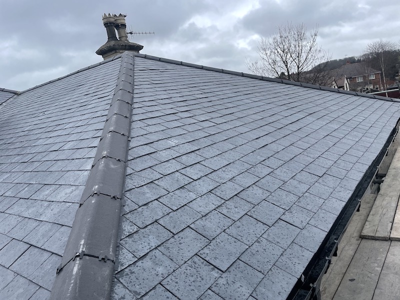 Professional roofing team installing a new pitched tile roof on a residential property in Leicestershire