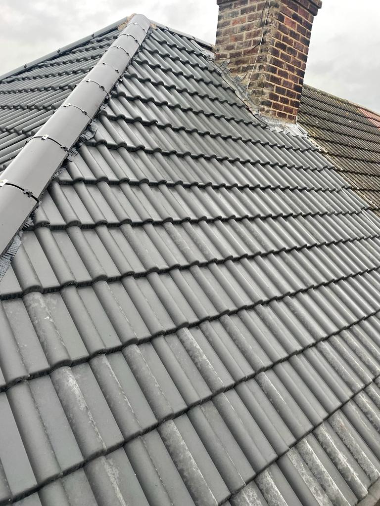 Sykes Roofing team installing a new pitched tile roof on a residential property in Leicestershire